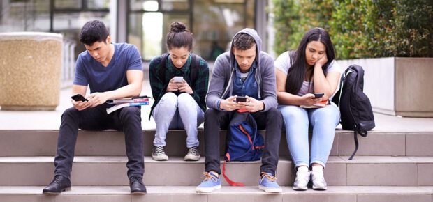 Shot of a university students on campus