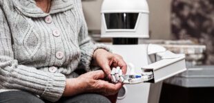 autonomous caregiver robot is holding a insulin syringe, giving it to an senior adult woman in her living room, concept ambient assisted living