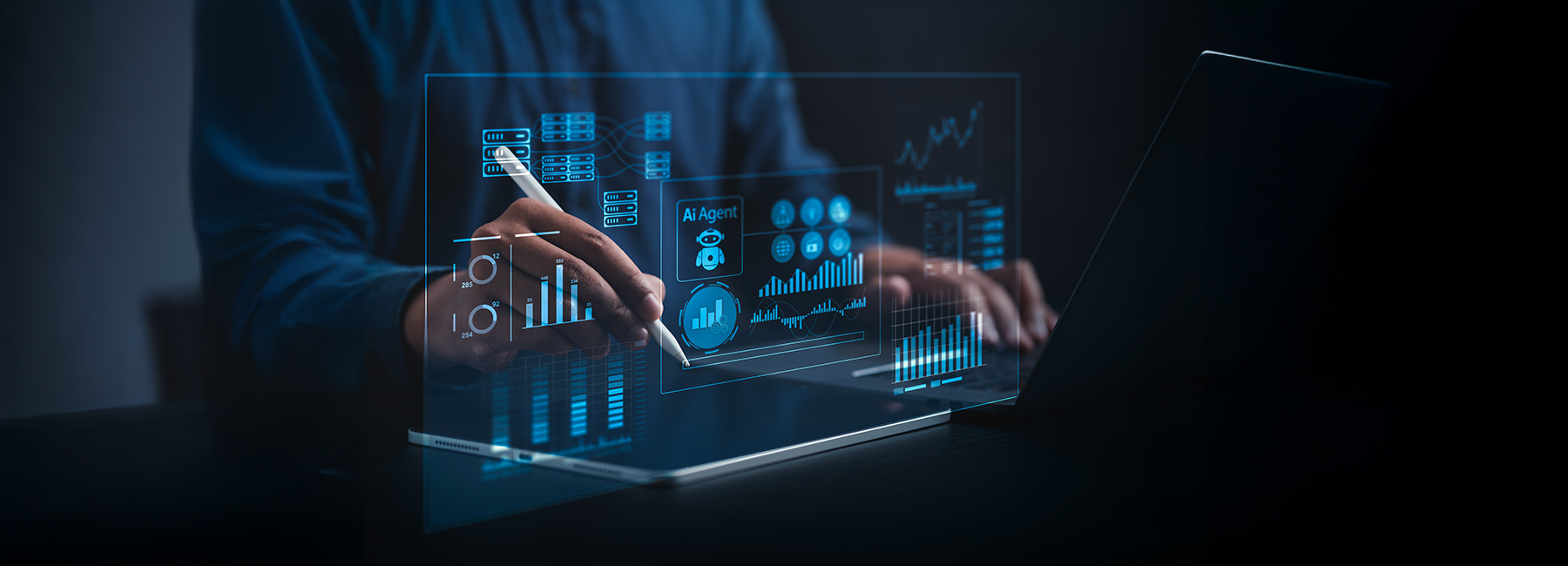 AI Business Analyst Collaborating with Virtual AI Agent to Analyze Big Data in Real Time on a Holographic Dashboard with Computers and Laptops in a Dark Blue-Lit Room
