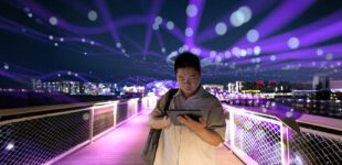 Asian man using artificial intelligence