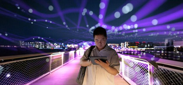 Asian man using artificial intelligence