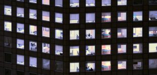 Office building with illuminated window pattern